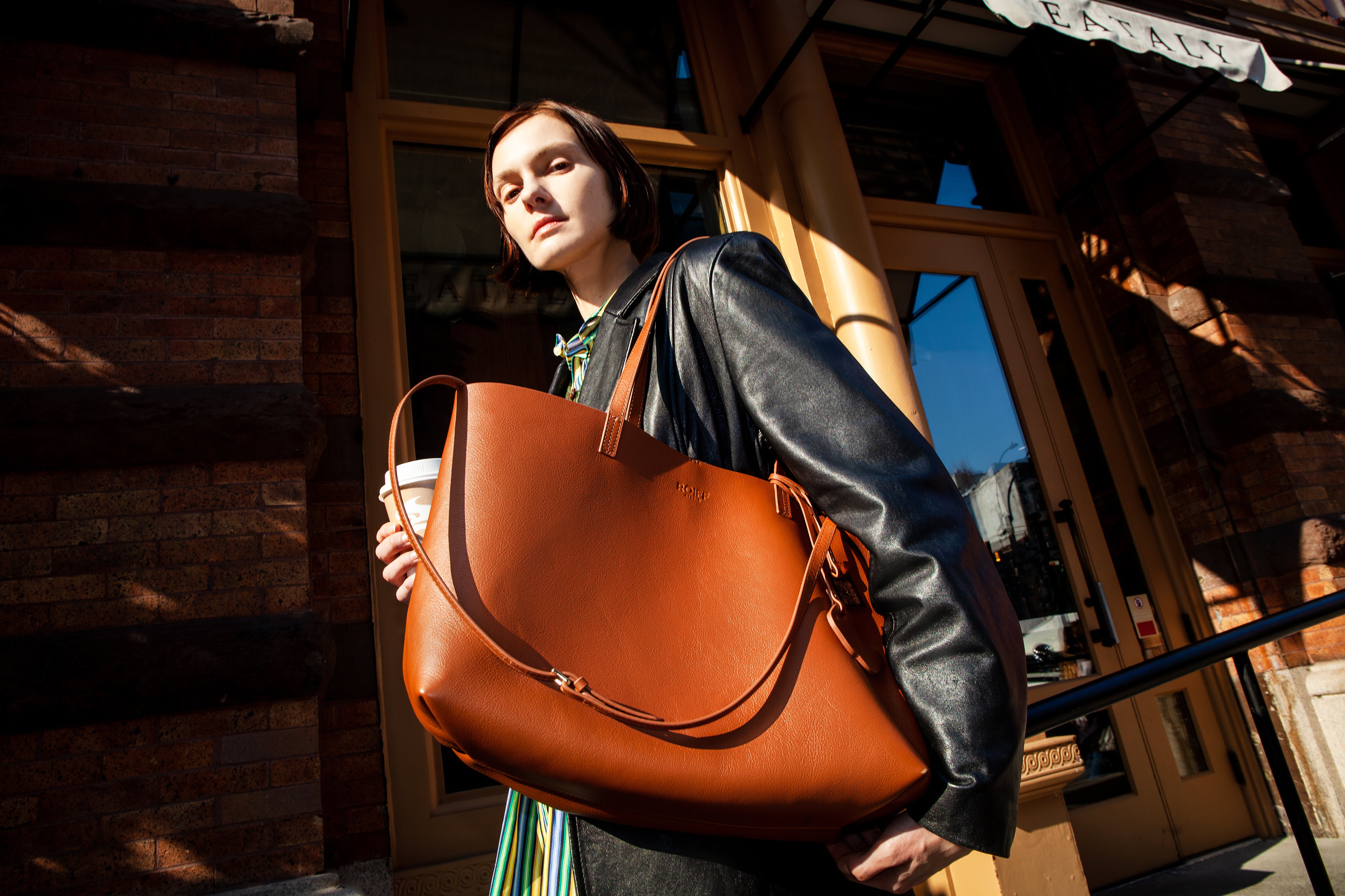 Elegant model showcasing ROIFF Studio's signature style on the main homepage banner, featuring modern and timeless designs.
